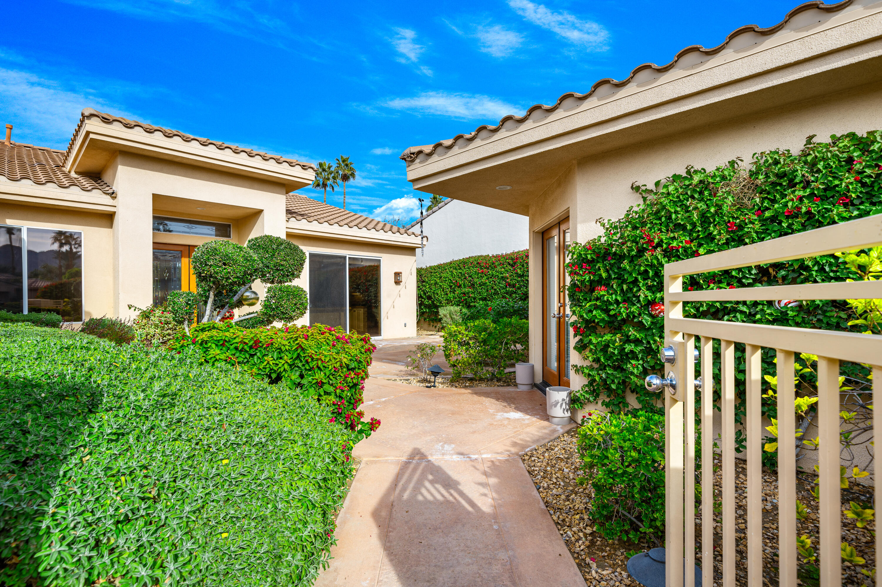 79060 River Rock Road La Quinta, CA 92253 - Photo 3 of 36 a front view of house with green space