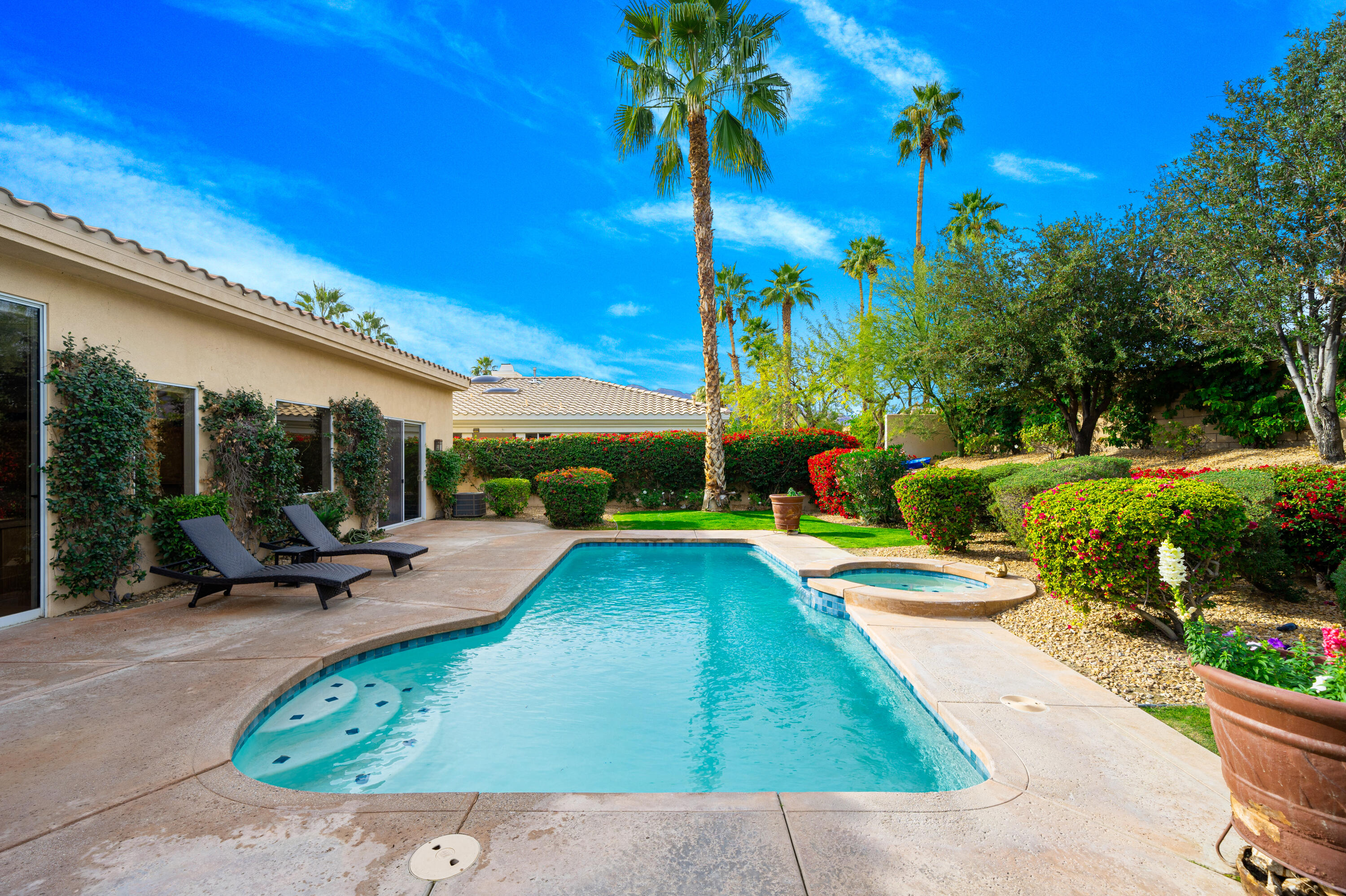79060 River Rock Road La Quinta, CA 92253 - Photo 31 of 36 a view of an outdoor space and swimming pool