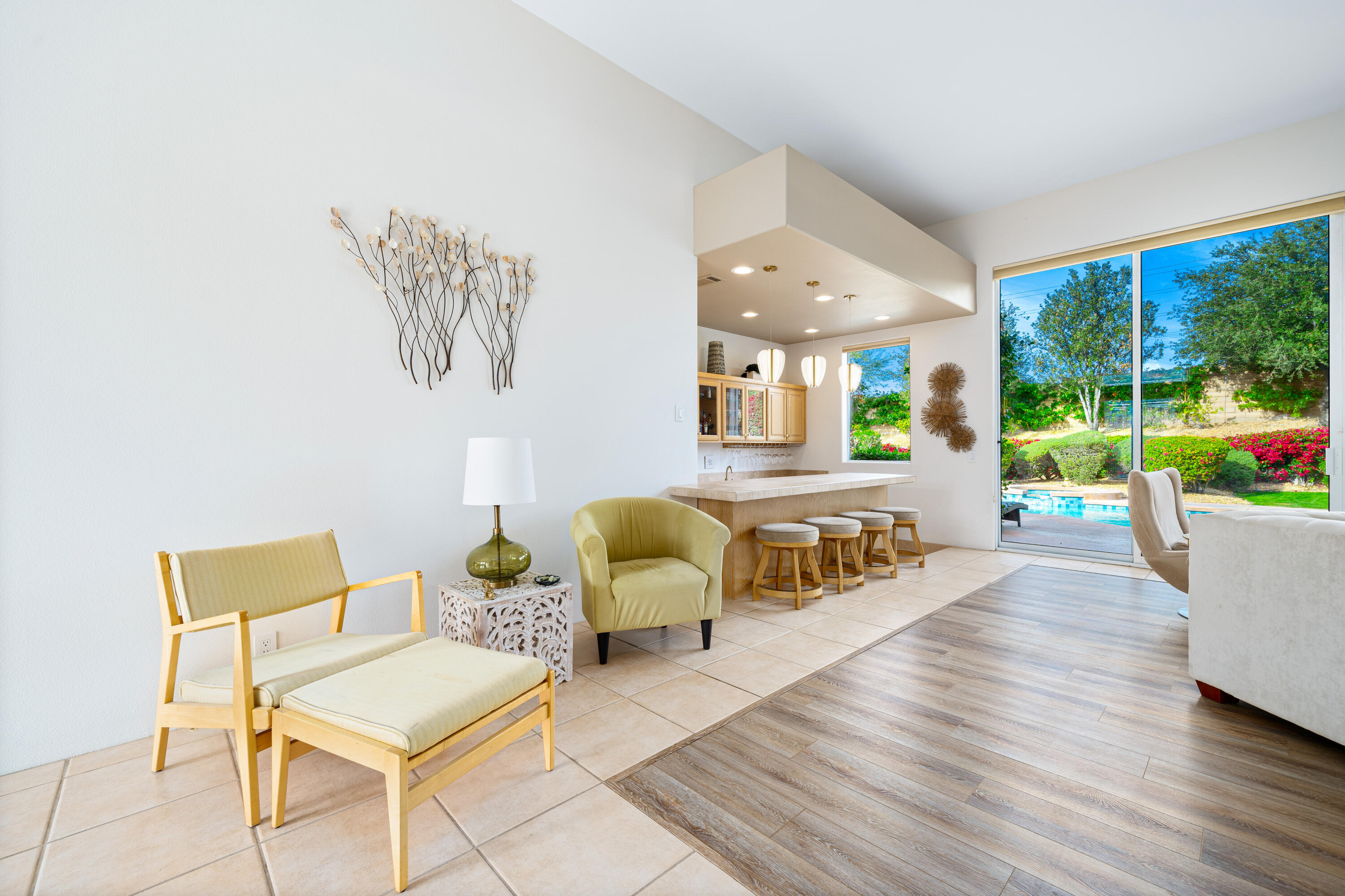 79060 River Rock Road La Quinta, CA 92253 - Photo 9 of 36 a living room with furniture and a wooden floor