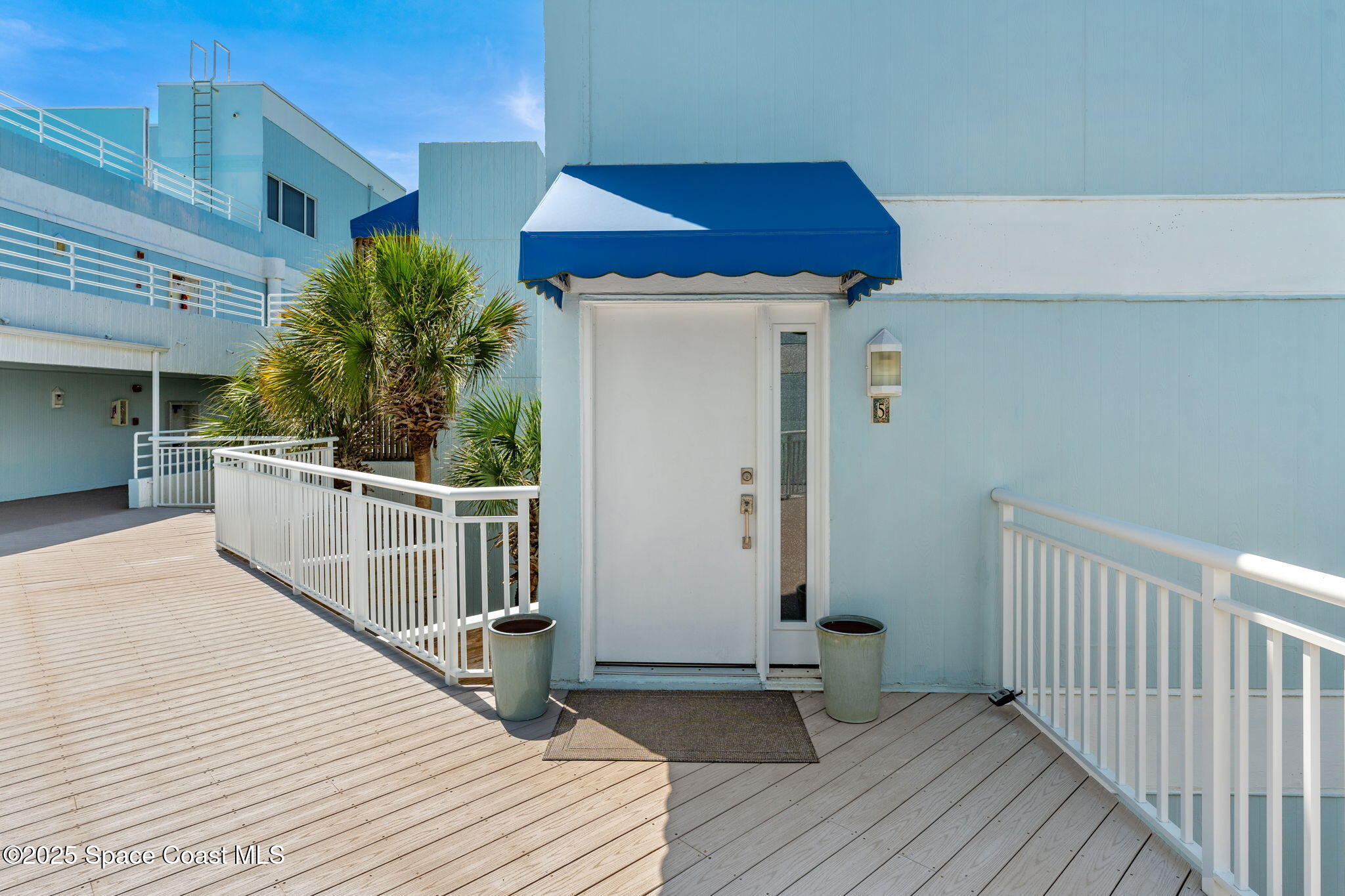 6355 South Hwy A1A, Unit 5 Melbourne Beach, FL 32951 - Photo 25 of 37 a view of a deck