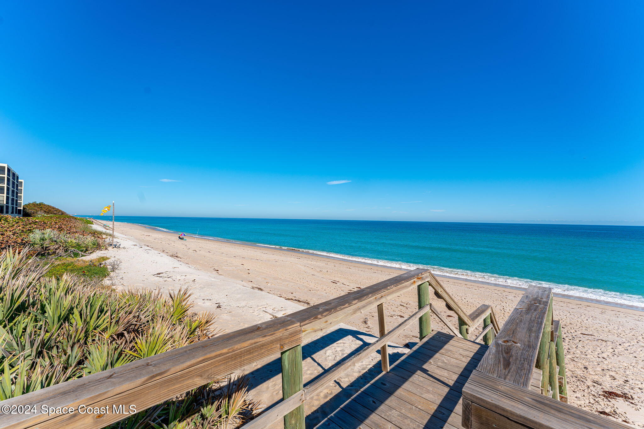 6355 South Hwy A1A, Unit 5 Melbourne Beach, FL 32951 - Photo 28 of 37 a view of an ocean from a balcony