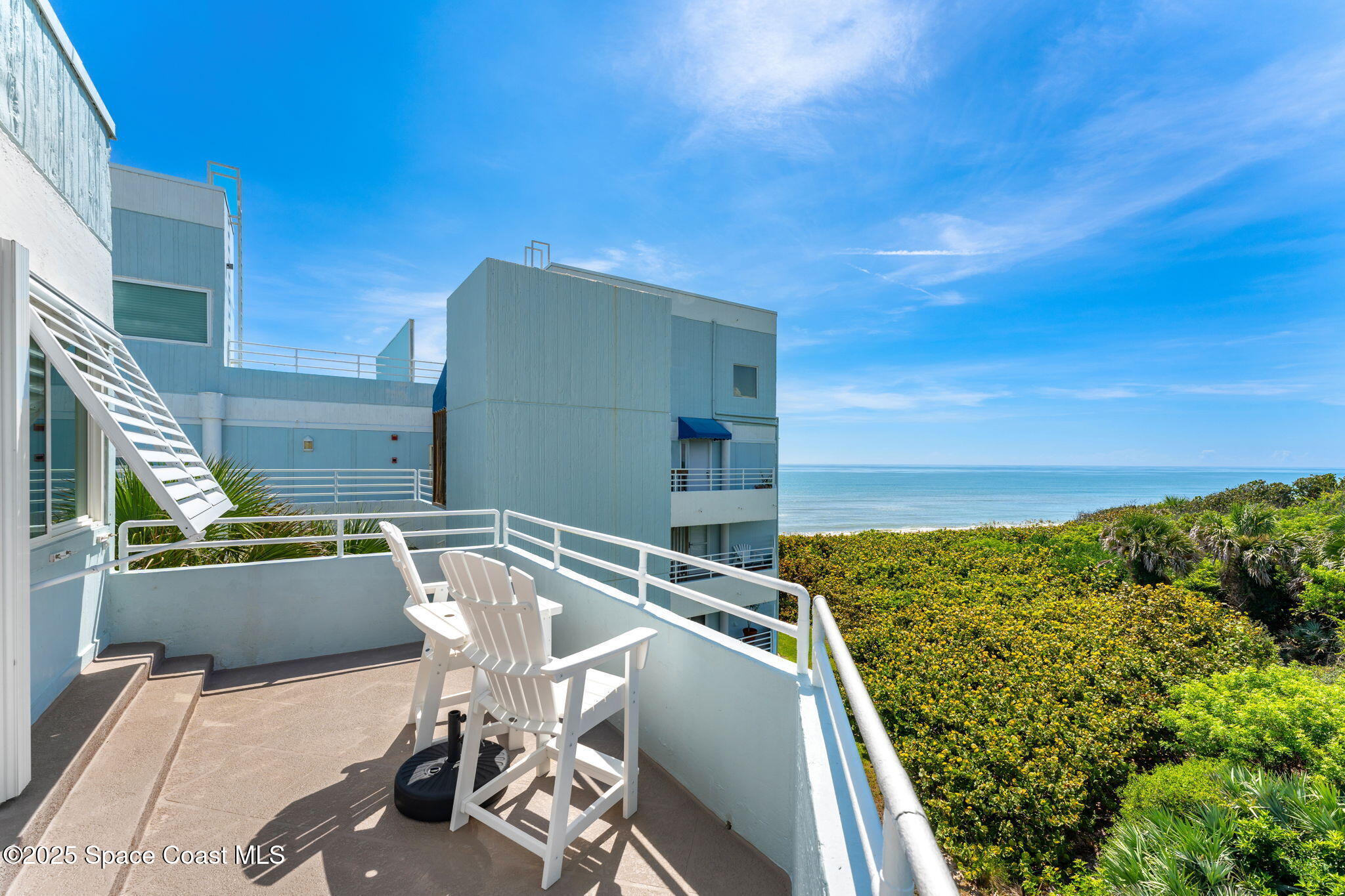 6355 South Hwy A1A, Unit 5 Melbourne Beach, FL 32951 - Photo 3 of 37 a view of balcony with chairs