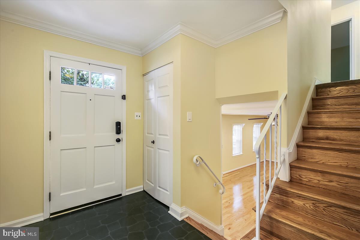 1709 Woodwell Road Silver Spring, MD 20906 - Photo 3 of 40 Foyer opens onto the living room.