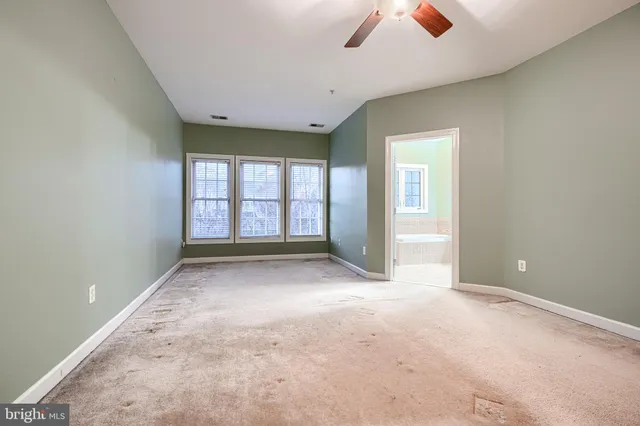 a bathroom with a bathtub and a sink
