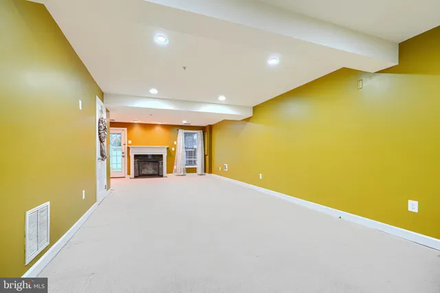 a view of a big room with a swimming pool