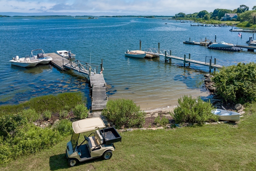 1680 C Drift Road Westport, MA 02790 - Photo 12 of 36 a view of a lake with a yard