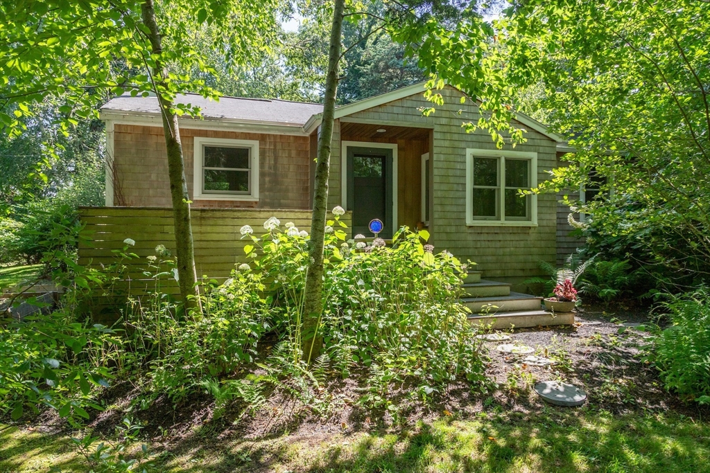 1680 C Drift Road Westport, MA 02790 - Photo 14 of 36 a front view of a house with a yard