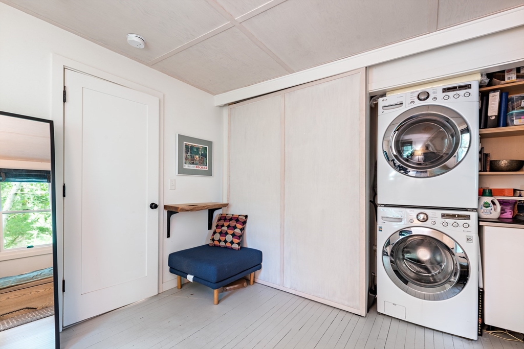 1680 C Drift Road Westport, MA 02790 - Photo 28 of 36 a view of a hallway with washer and dryer