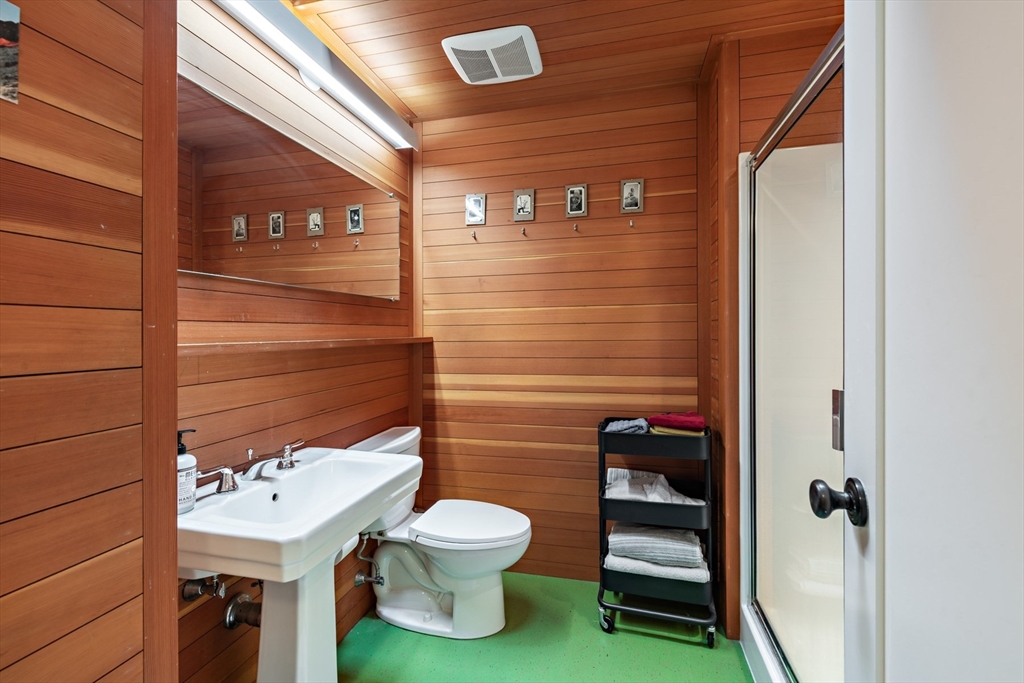 1680 C Drift Road Westport, MA 02790 - Photo 30 of 36 a bathroom with a toilet and a sink