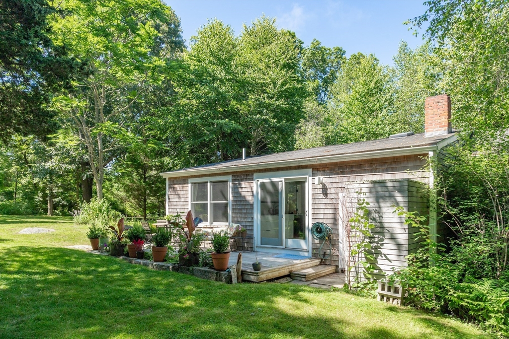 1680 C Drift Road Westport, MA 02790 - Photo 31 of 36 a front view of house with yard and green space