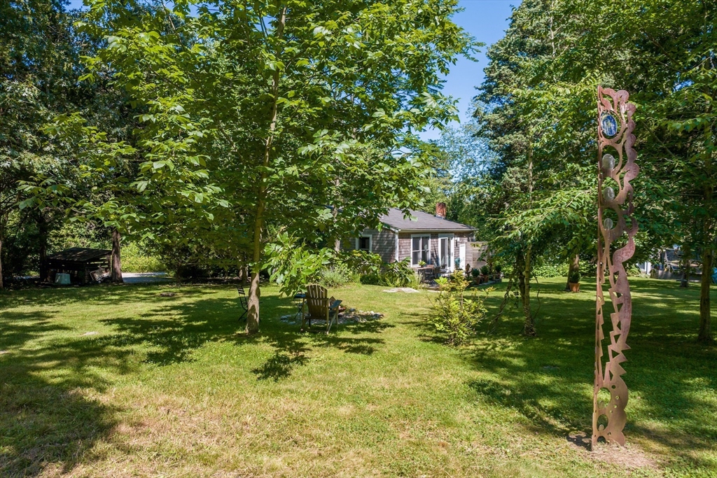 1680 C Drift Road Westport, MA 02790 - Photo 33 of 36 a view of a house with a big yard and large trees
