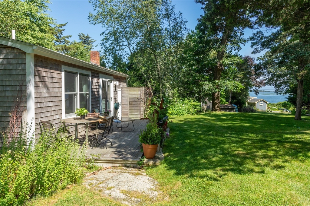 1680 C Drift Road Westport, MA 02790 - Photo 6 of 36 a view of house with backyard and sitting area