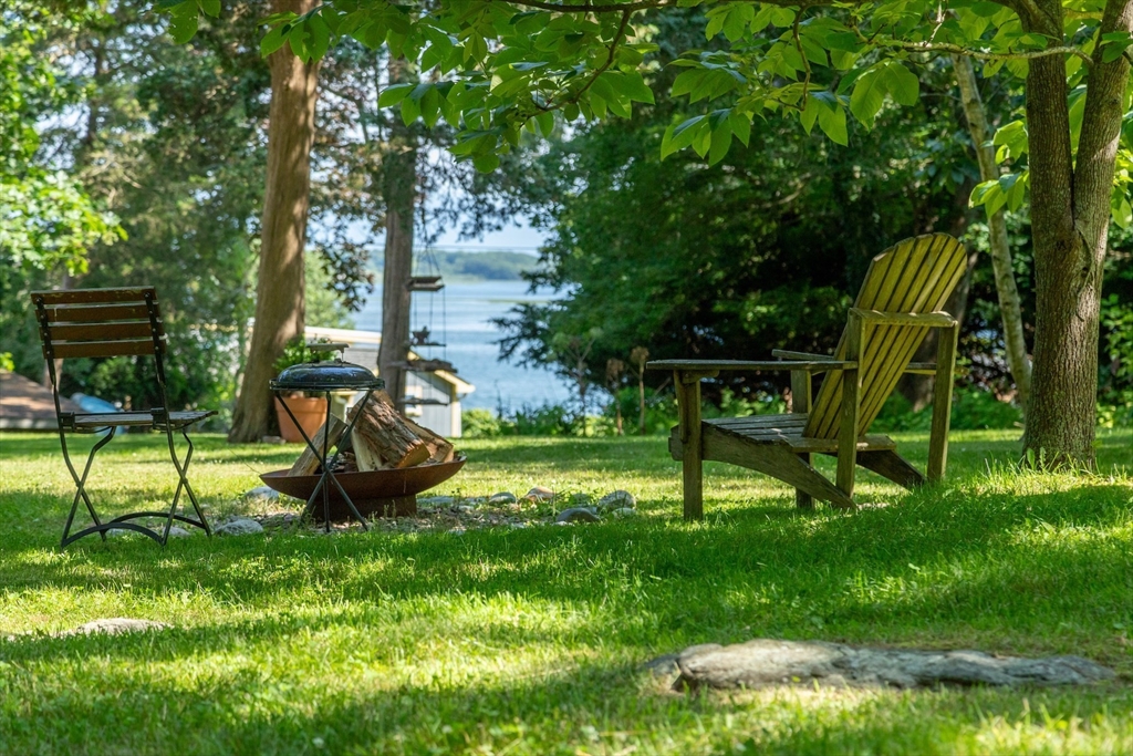 1680 C Drift Road Westport, MA 02790 - Photo 9 of 36 a view of a park with slide and a bench