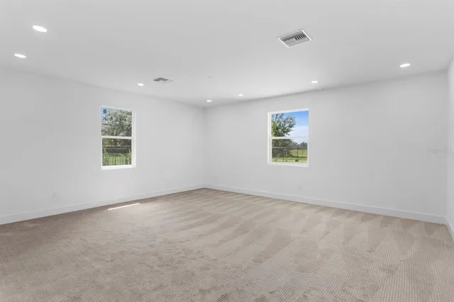 a view of a kitchen with electric appliances