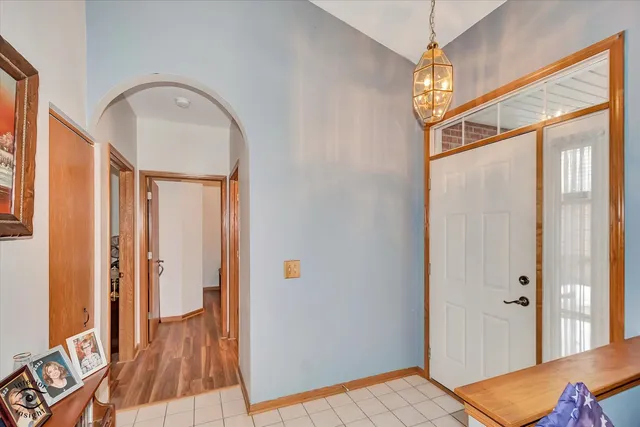 a view of entryway with wooden floor