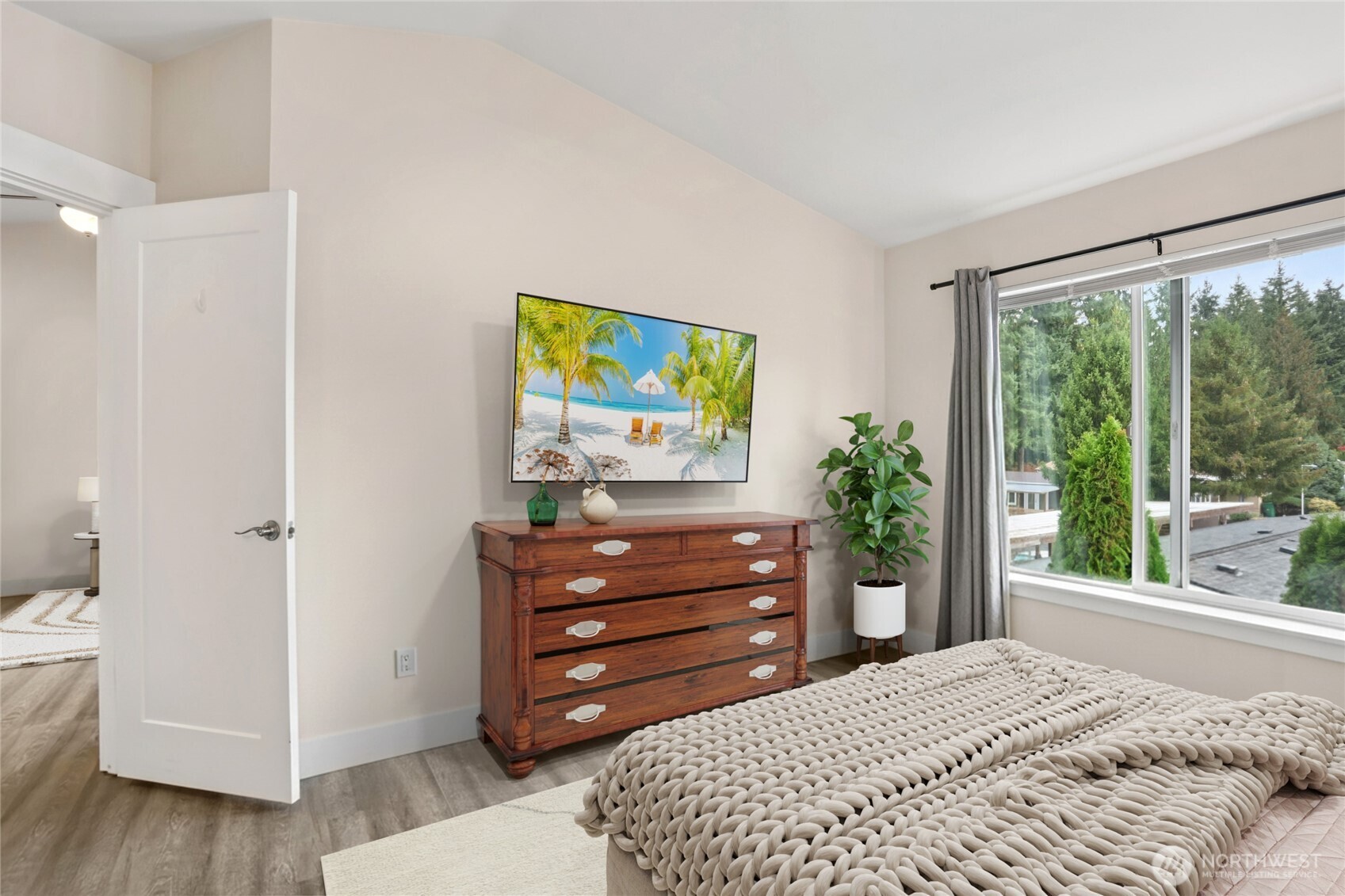 2009 196th Street Southeast, Unit E302 Bothell, WA 98012 - Photo 11 of 21 a bedroom with a bed window and a dresser