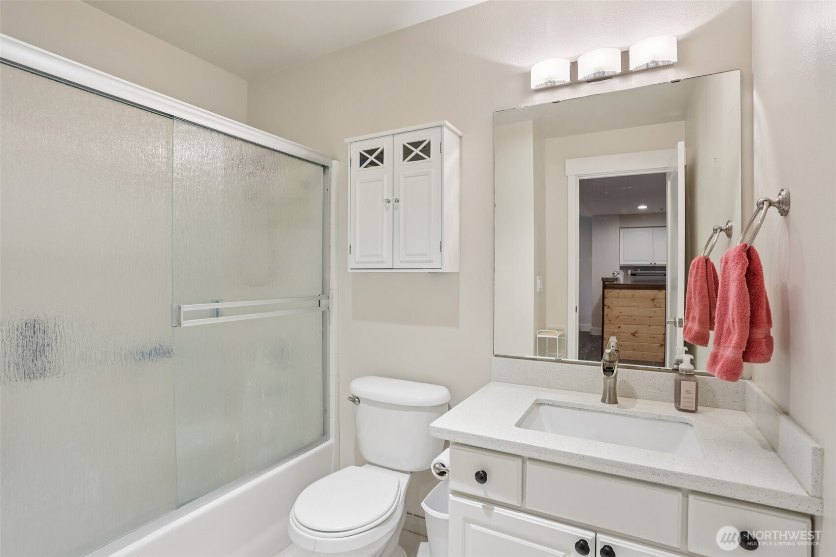2009 196th Street Southeast, Unit E302 Bothell, WA 98012 - Photo 15 of 21 a bathroom with a sink vanity mirror and toilet