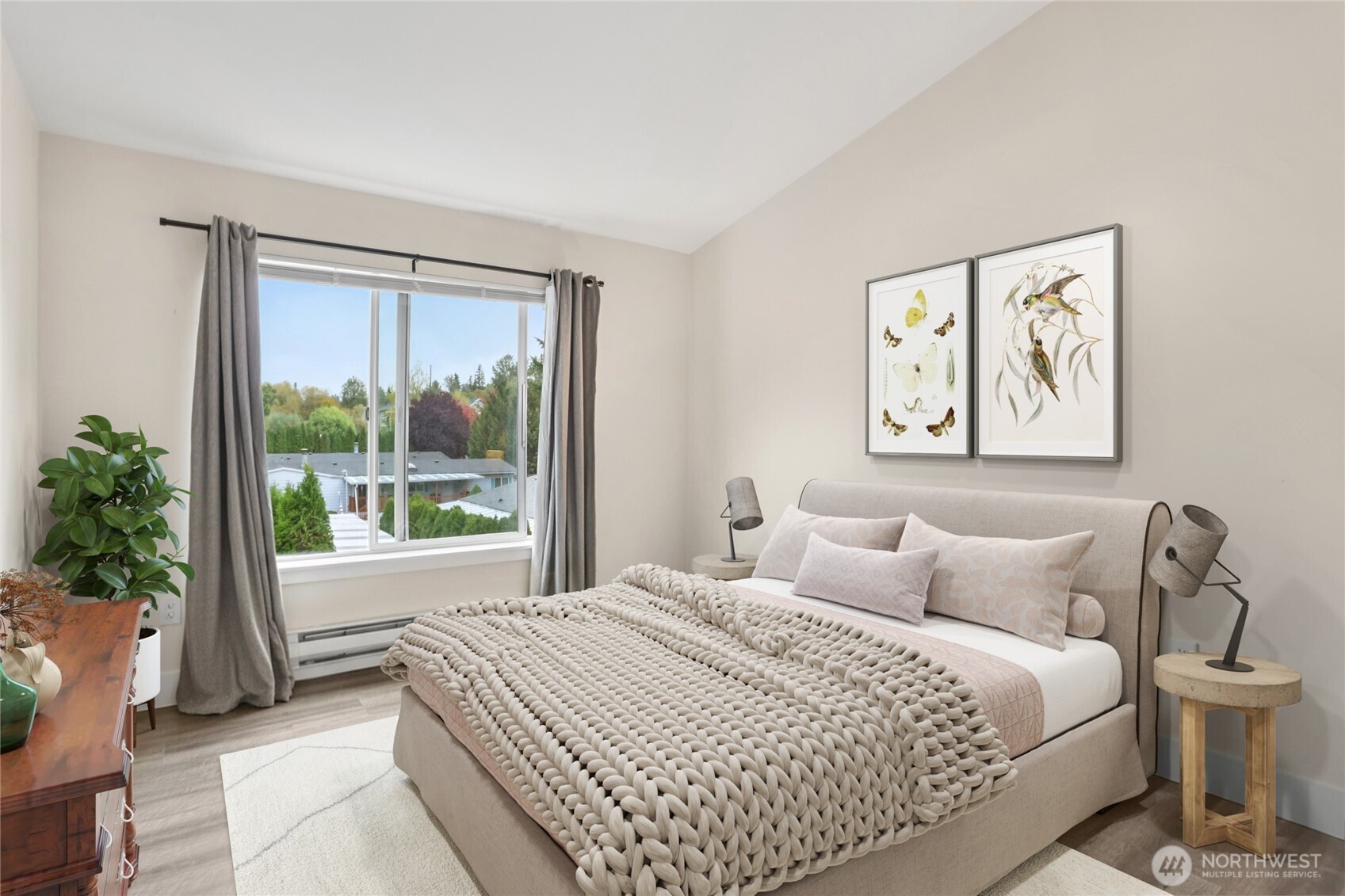 2009 196th Street Southeast, Unit E302 Bothell, WA 98012 - Photo 10 of 21 a bedroom with a large bed and a large window