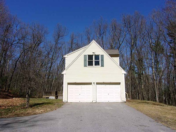 49 West Groton Road Shirley, MA 01464 - Photo 4 of 30 a view of a house with a yard and garage