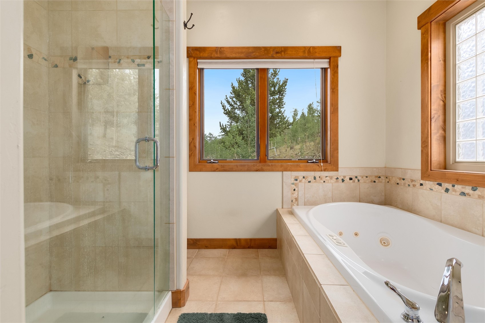 592 Ponderosa Road Fairplay, CO 80440 - Photo 26 of 45 a bathroom with a bathtub and a shower