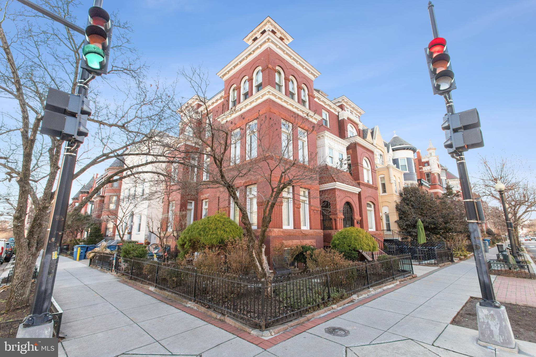 1755 18th Street Northwest, Unit 101 Washington, DC 20009 - Photo 13 of 17 a front view of a multi story residential apartment building with entryway