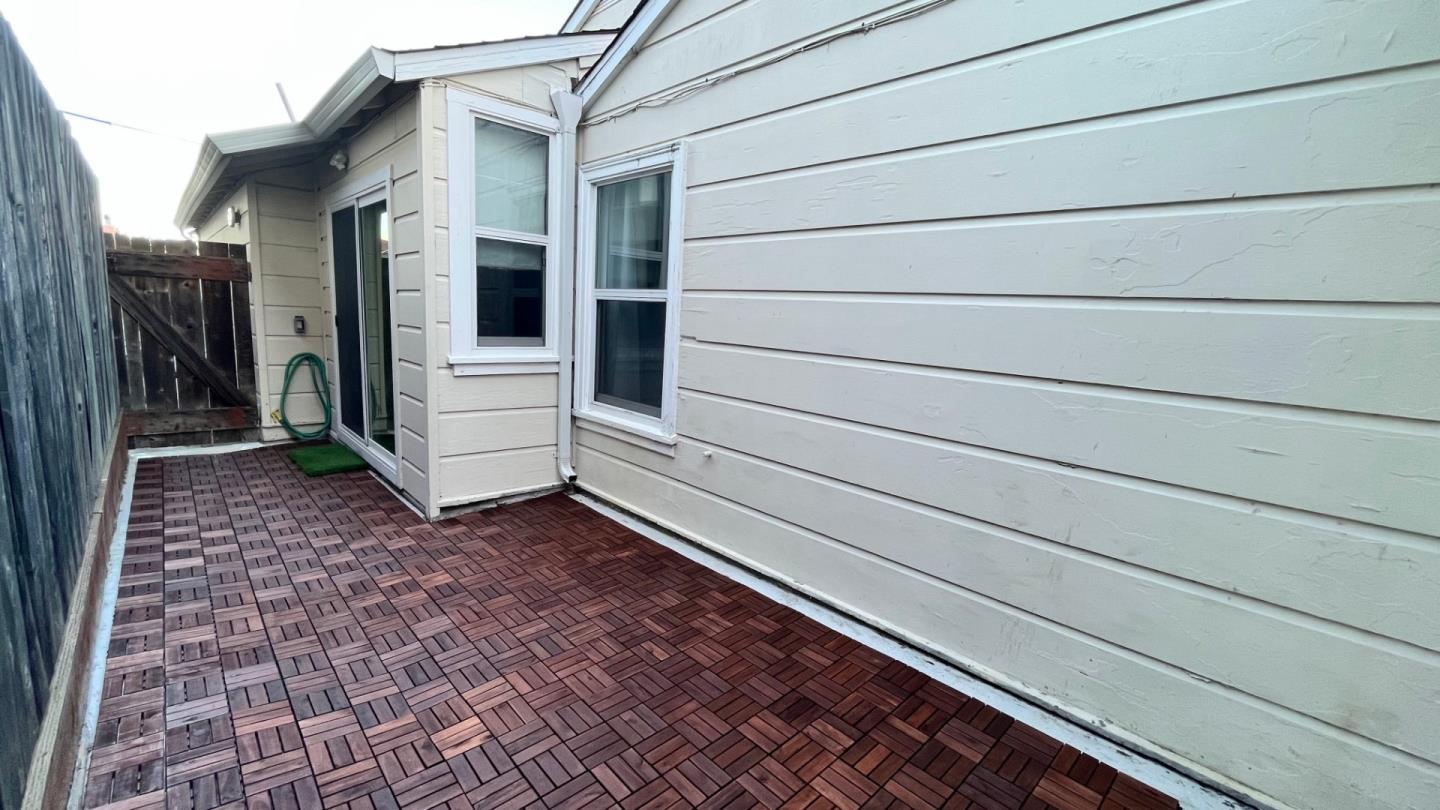 161 Laurel Avenue Millbrae, CA 94030 - Photo 22 of 24 a view of a house with a bench