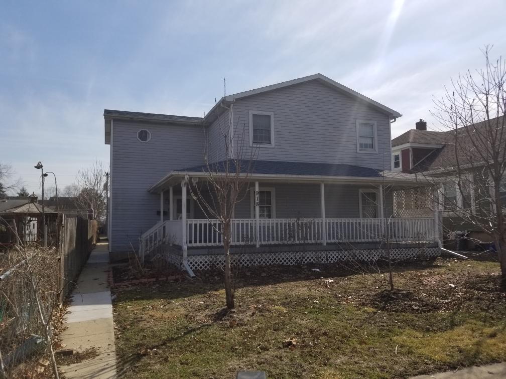 918 6th Street, Unit 3 LaSalle, IL 61301 - Photo 1 of 4 a house with a yard