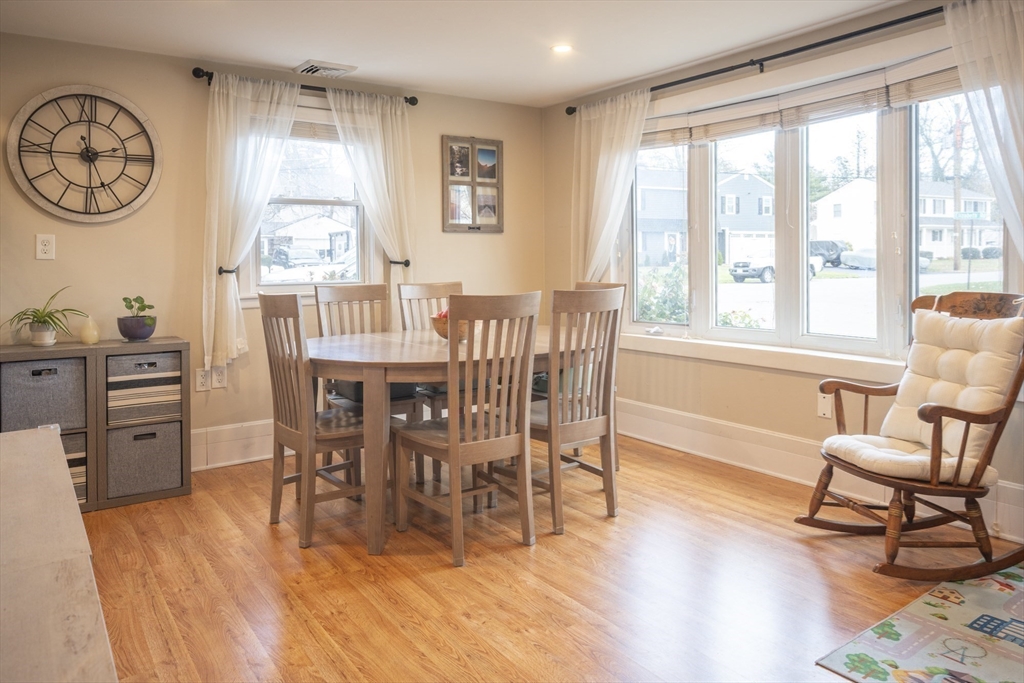 64 Elizabeth Road Billerica, MA 01821 - Photo 6 of 25 a view of a dining room with furniture window and wooden floor