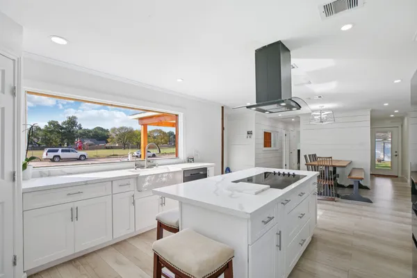 a view of living room with granite countertop furniture and a fireplace