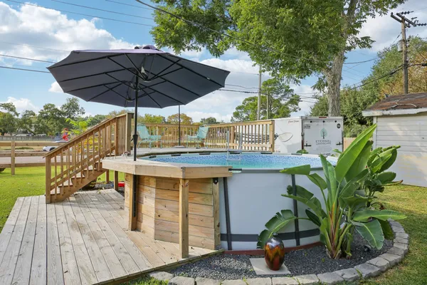 a view of outdoor space yard deck patio and outdoor kitchen