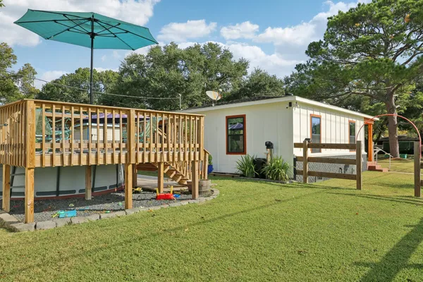 a house view with a garden space