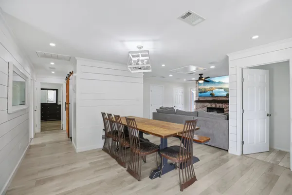 a view of a dining room with furniture