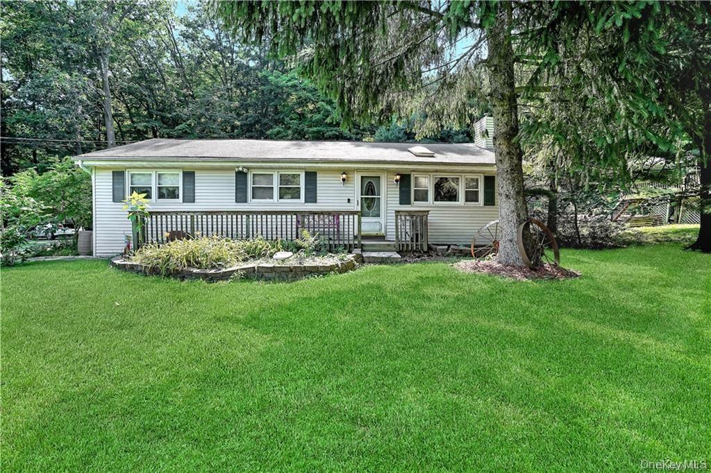 35 Peddler Hill Road Monroe, NY 10950 - Photo 1 of 23 a front view of a house with a garden