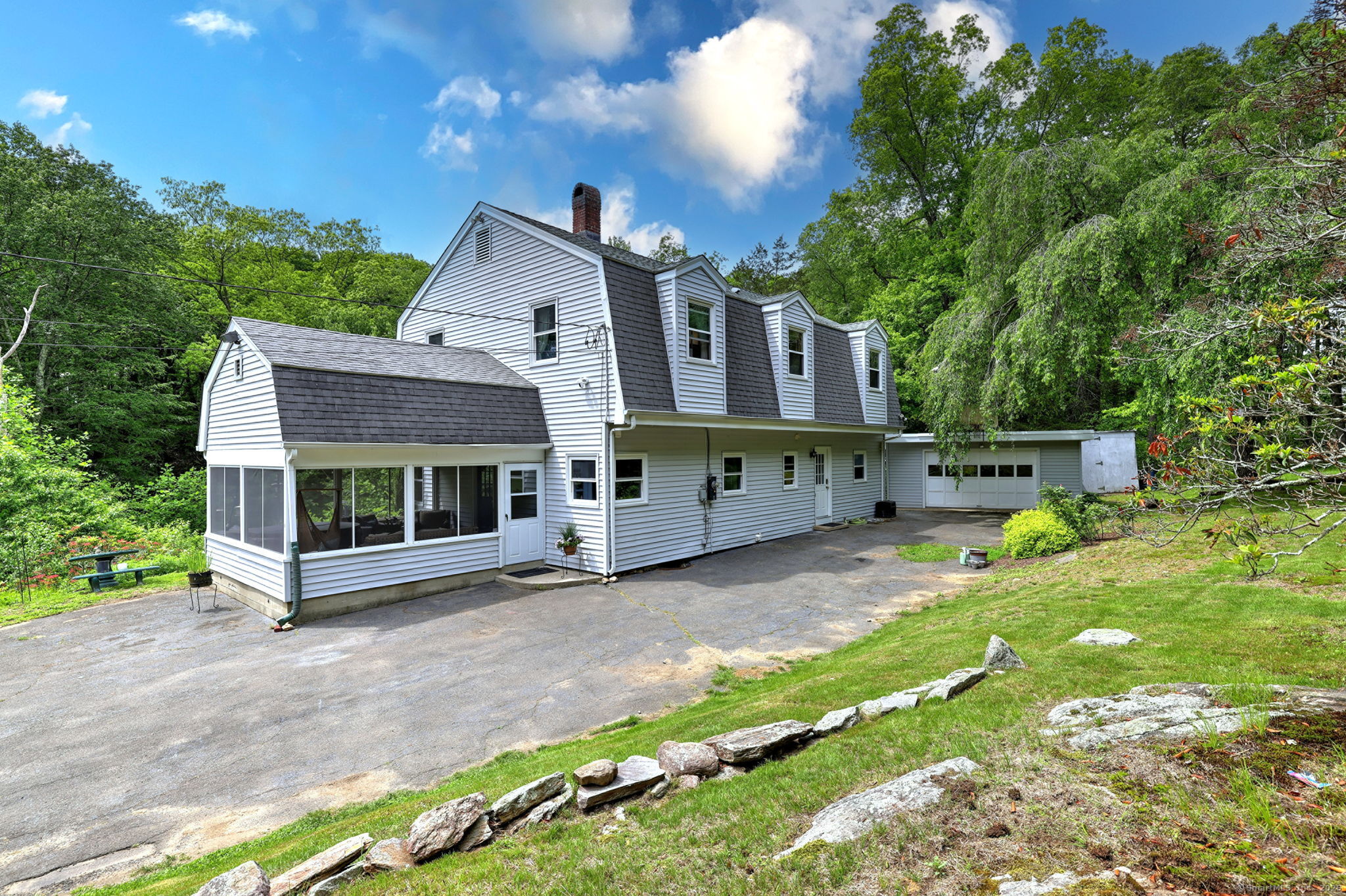 8 Whippoorwill Lane Bethany, CT 06524 - Photo 1 of 1 a view of a house with garden