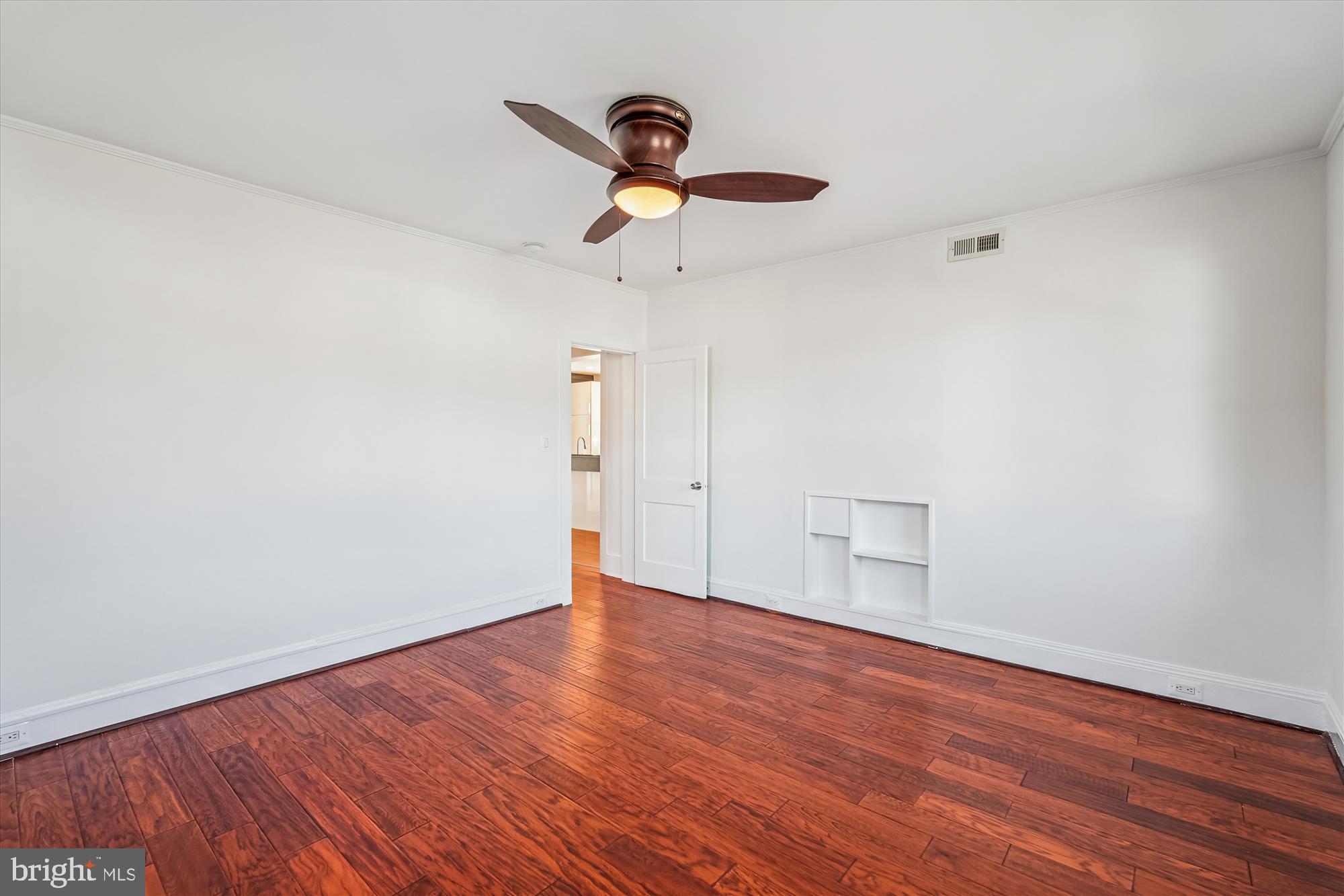 104 Pershing Avenue Northwest Leesburg, VA 20176 - Photo 16 of 36 a view of empty room with wooden floor