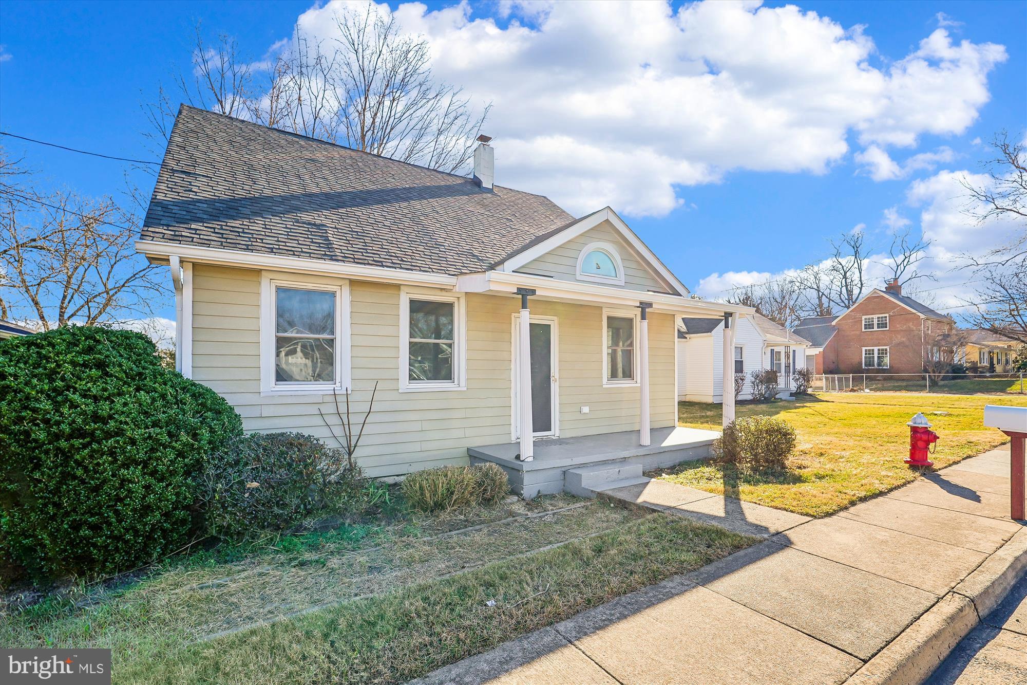 104 Pershing Avenue Northwest Leesburg, VA 20176 - Photo 35 of 36 a view of a house with swimming pool and sitting area