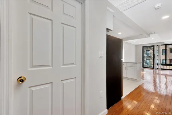 a kitchen with stainless steel appliances a refrigerator stove microwave and cabinets