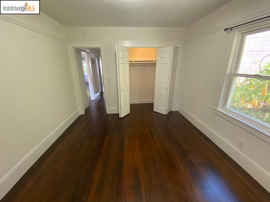 2124 Fifth Street Berkeley, CA 94710 - Photo 11 of 25 a view of an empty room with wooden floor and a window