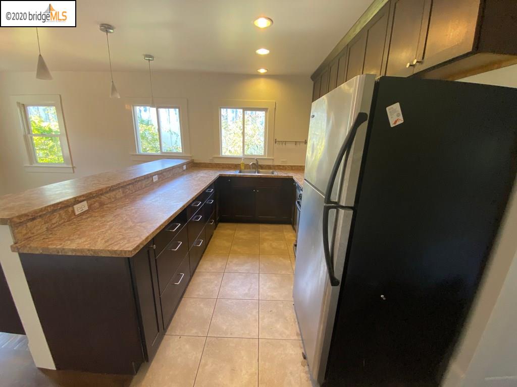 2124 Fifth Street Berkeley, CA 94710 - Photo 14 of 25 a bathroom with a double vanity sink and a bathtub