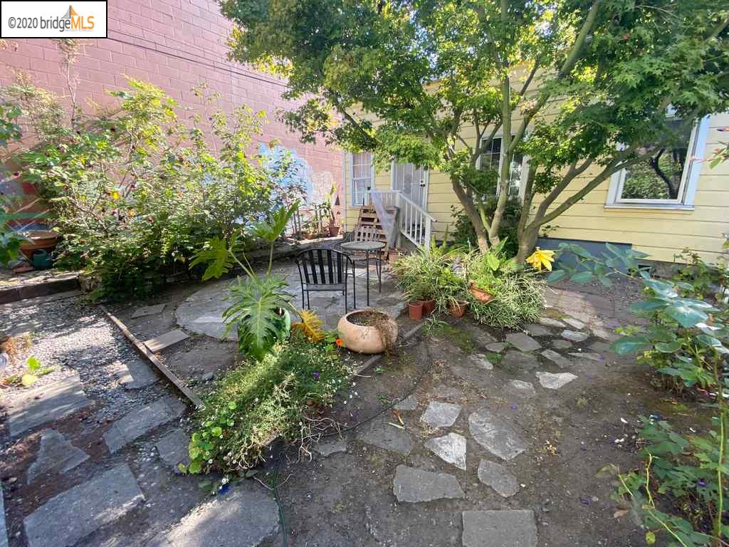 2124 Fifth Street Berkeley, CA 94710 - Photo 24 of 25 a view of a backyard with plants and a patio