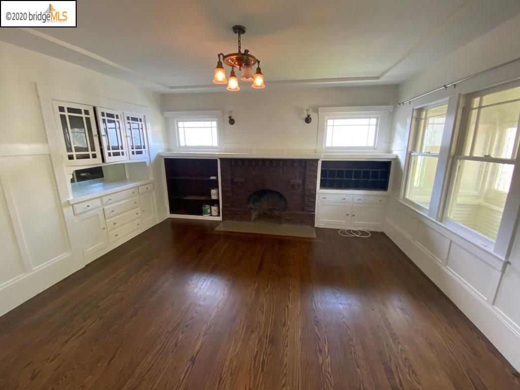 2124 Fifth Street Berkeley, CA 94710 - Photo 4 of 25 wooden floor in an empty room with a window
