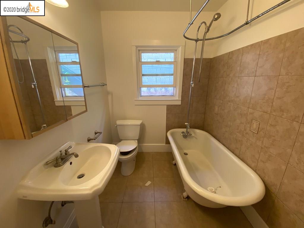 2124 Fifth Street Berkeley, CA 94710 - Photo 9 of 25 a bathroom with a sink a toilet and bathtub