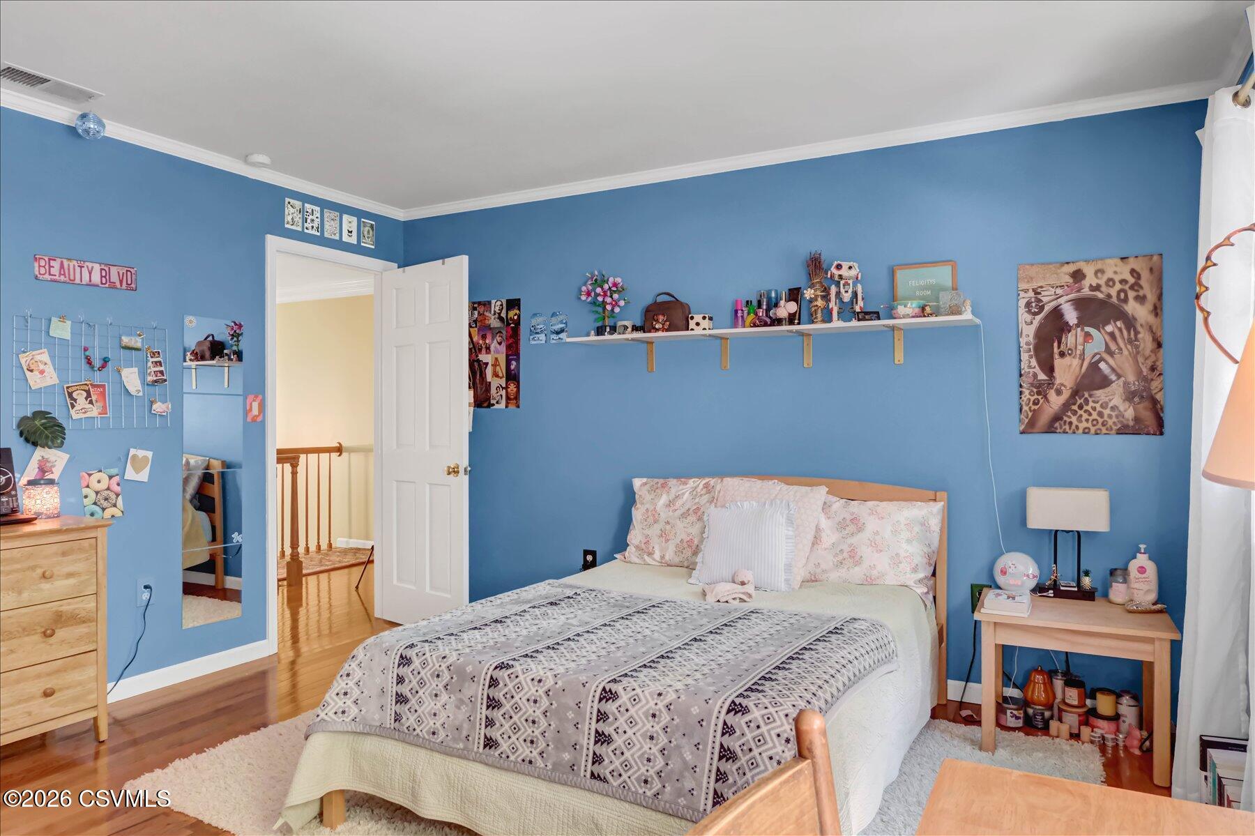 65 Crestview Drive Winfield, PA 17889 - Photo 37 of 70 a bedroom with a bed and a refrigerator
