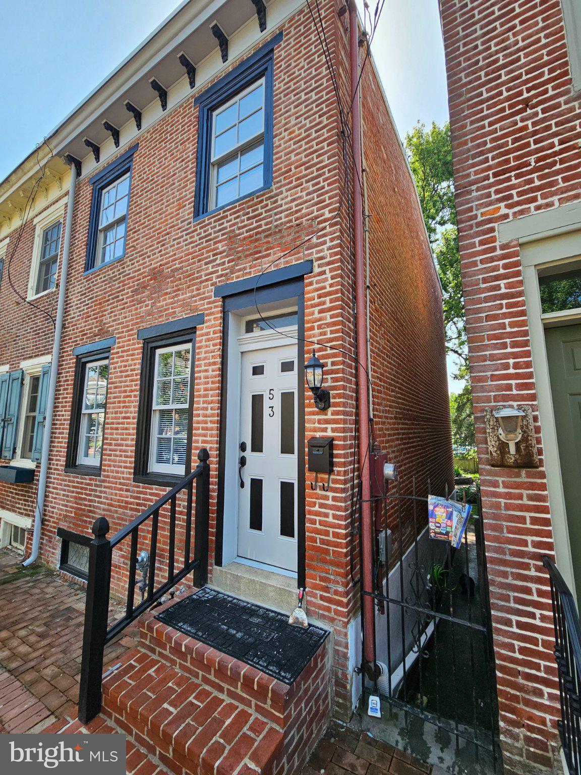 53 West 4th Street New Castle, DE 19720 - Photo 2 of 21 Charming brick facade with modern flair.