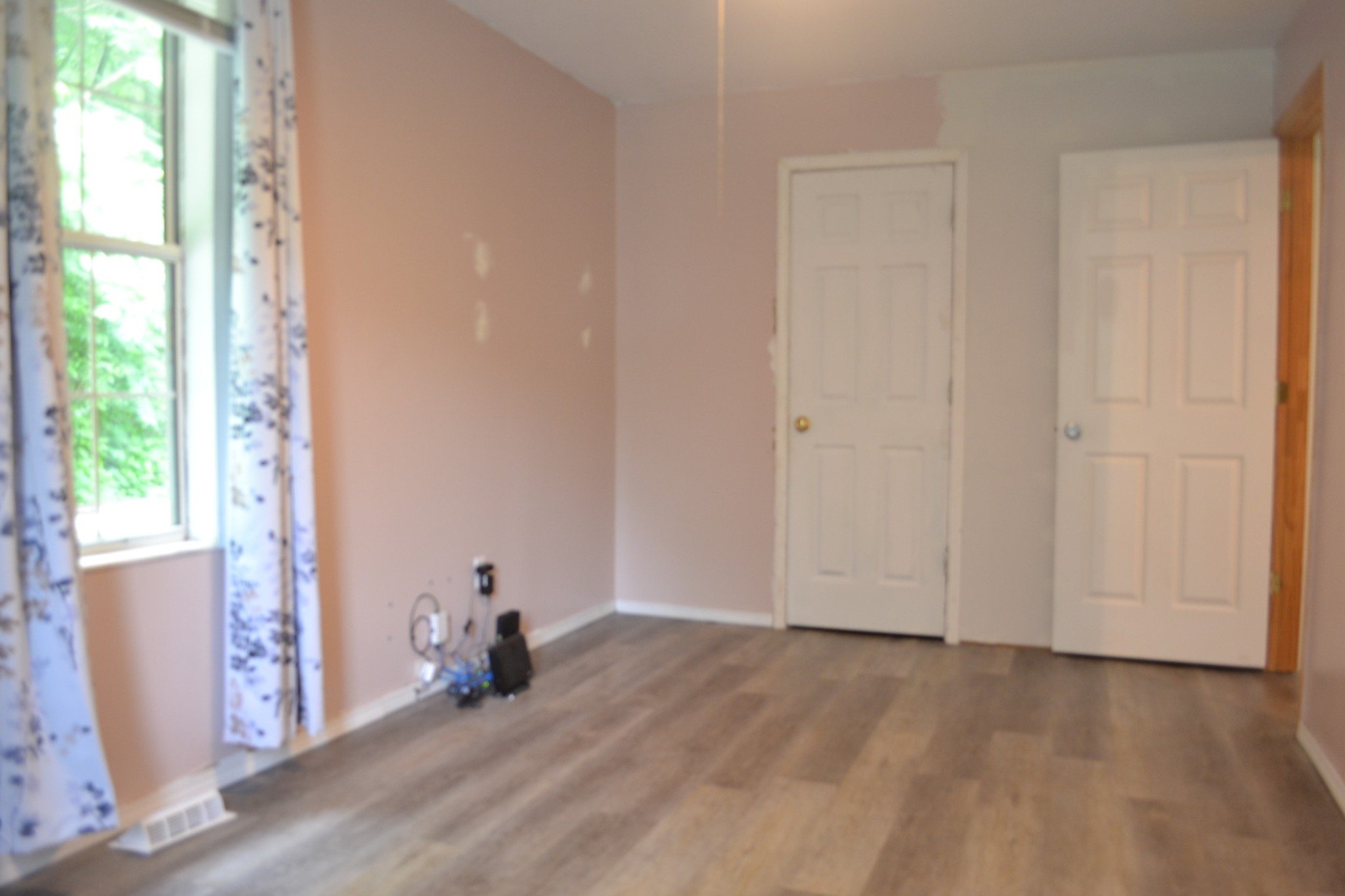 1505 Add Stafford Road Hilham, TN 38568 - Photo 20 of 65 a view of empty room with wooden floor and fan