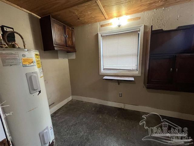 5733 Orange Street Milton, FL 32570 - Photo 14 of 32 a room with storage and utility