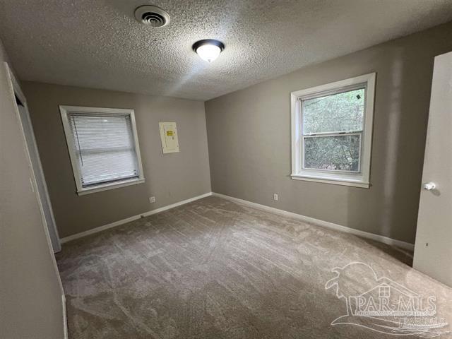 5733 Orange Street Milton, FL 32570 - Photo 15 of 32 a view of an empty room with a window