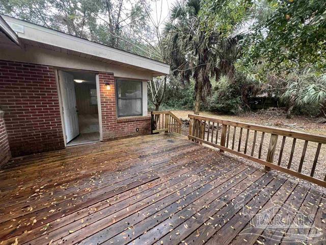 5733 Orange Street Milton, FL 32570 - Photo 19 of 32 a view of a house with a patio
