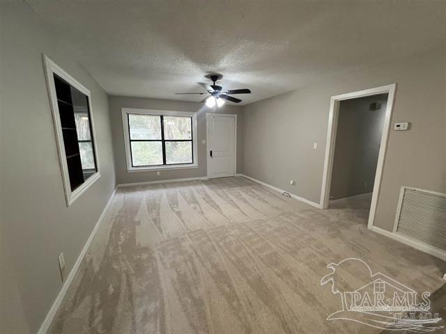 5733 Orange Street Milton, FL 32570 - Photo 20 of 32 wooden floor in an empty room with a window