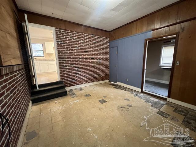 5733 Orange Street Milton, FL 32570 - Photo 21 of 32 a view of an empty room with a window